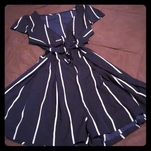 Navy blue and white romper (never worn)